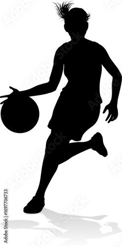 Silhouette of athletic woman female basketball player with basketball ball. Sports concept.