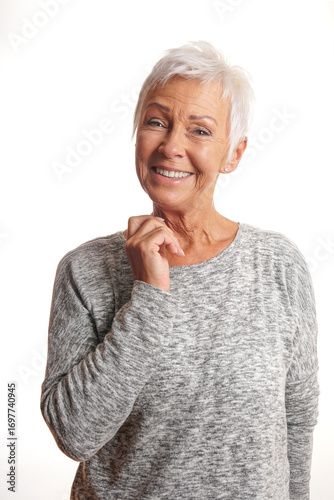 happy silver ager lady with short white hair and big smile