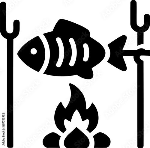 Fish cooking over open fire icon