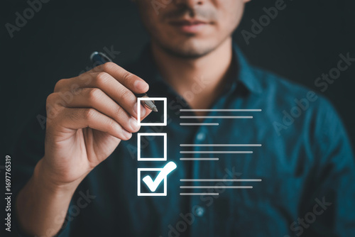 Checklist completion concept with man checking boxes for tasks and project management planning success