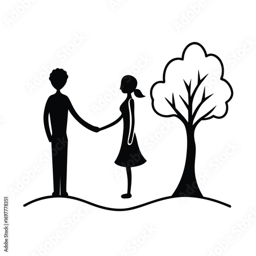 Romantic couple holding hands underneath a tree silhouette