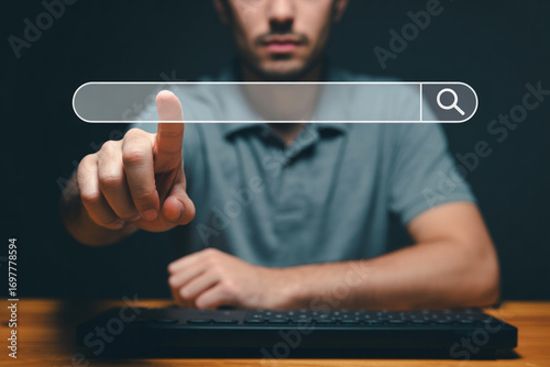 Man using search engine bar for online information retrieval and internet browsing concept image design