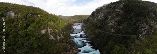 Strbački buk, 24.5 m high, is the highest and most spectacular waterfall in the National Park and its origin is due to tectonic movements and the formation of travertine deposits.