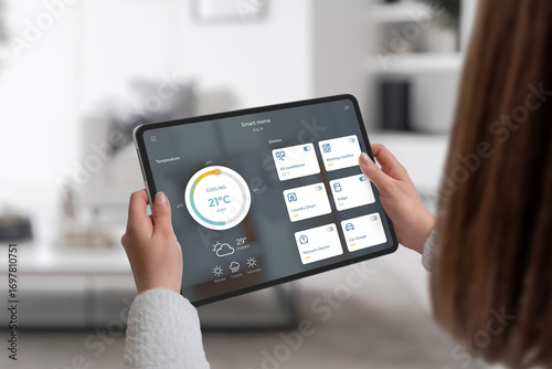 Modern smart home control displayed on tablet screen with connected devices