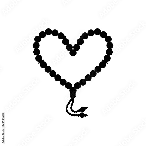 Silhouette of a heart-shaped prayer beads, Islamic religious item.