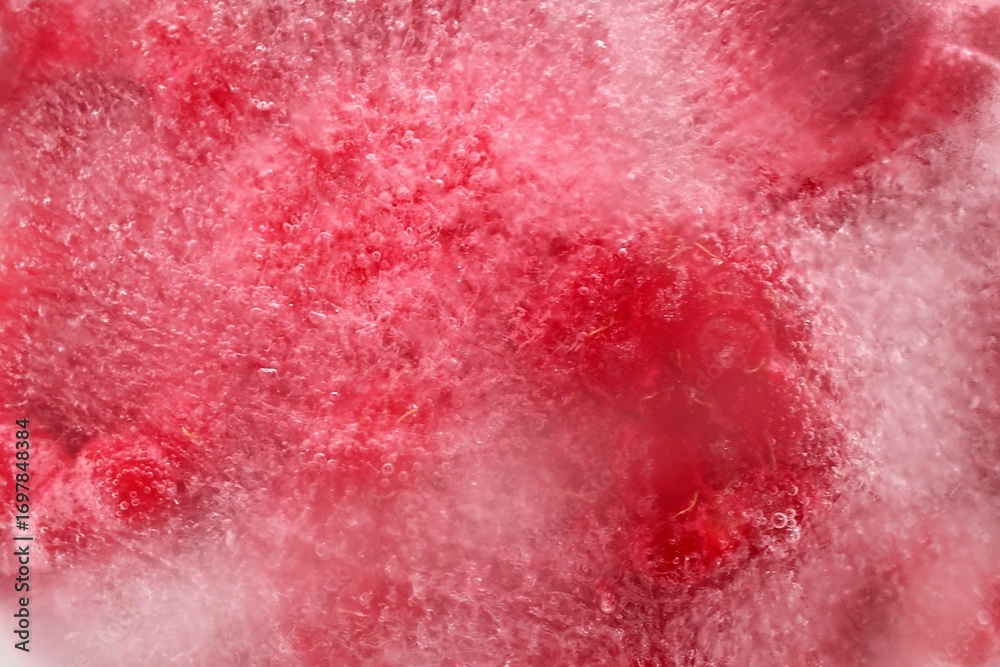 Obraz premium Abstract Frozen Red Raspberries. Captivating Blend of Color and Ice Crystals for Creative Use.