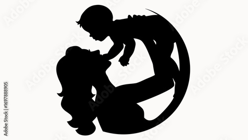 Silhouette of a mother holding her baby up in the air in a loving and tender embrace moment image