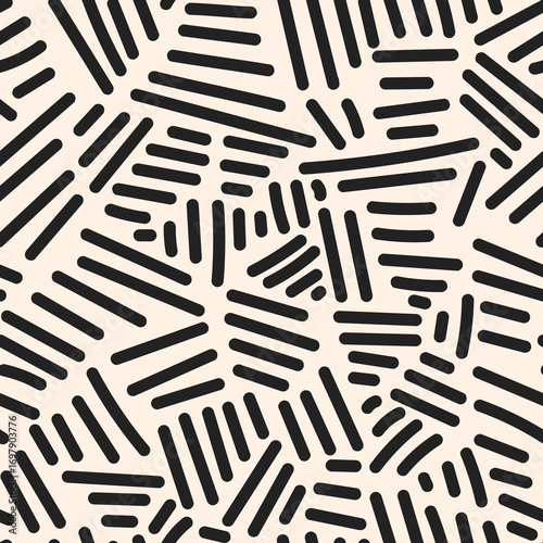 Black lines scatter on beige in a dynamic abstract repeat, ideal for wallpaper or textiles