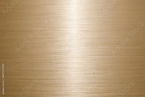 Elegant brushed gold metal texture background with subtle light gradient, perfect for adding a touch of luxury to any design project