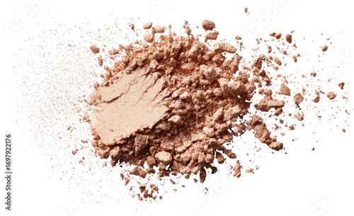 A close-up of loose, light brown powder.  The powder is concentrated in the center, with a lighter, streaky texture, and is surrounded by a cloud of fine particles