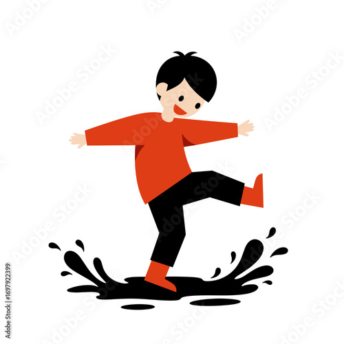 Young boy splashing in puddle while wearing red boots and smiling  