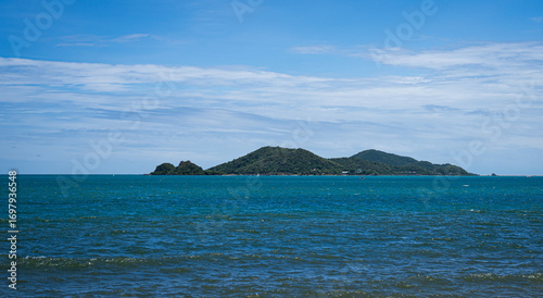 Beautiful blue sea and sky viewpoint from Luklom Beach, Samae San Island, Sattahip, Chonburi, Thailand. Scenic tropical seascape with crystal water, horizon, and serene travel destination.