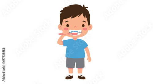Young boy brushing his teeth with a toothbrush and toothpaste