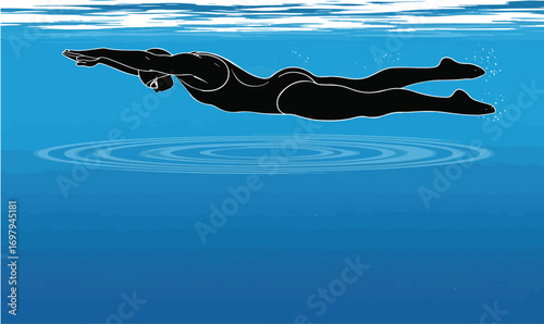 Silhouette of a swimmer underwater in a blue pool with ripples swimming dive