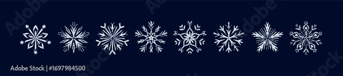 Set of crayon, pencil, chalk, charcoal, pastel hand drawn snowflakes on dark blue background. Kids snow flake scribbles and stretches on blackboard. Winter Christmas and New year decoration