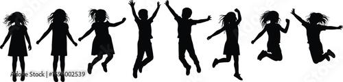 Children in silhouette jumping and playing with excitement and energy Keywords: children, silhouette, jumping, playing