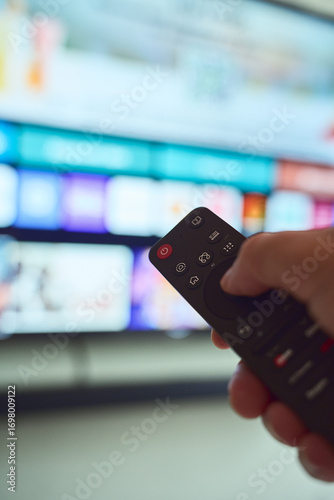 Smart TV remote in hand