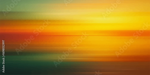 Sunset over the ocean with colorful sky and clouds reflecting on the sea