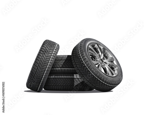 Car tires with a great profile in the car repair shop. Set of summer or winter tyres in front of white fond. On transparent PNG background.