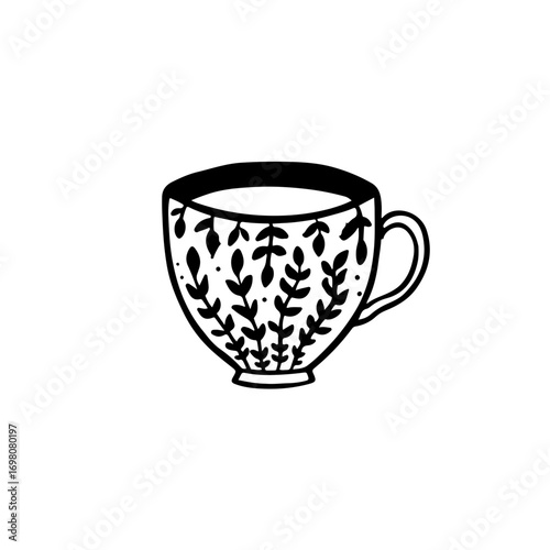 Charming floral patterned teacup filled with warm beverage, perfect for cozy mornings and artisanal cafes.