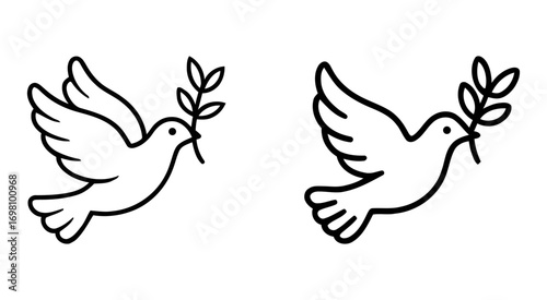 white doves carrying olive branches in flight. dove of peace