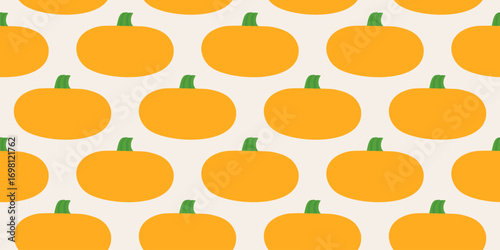 Vector seamless simple pattern with bright yellow pumpkins on light background