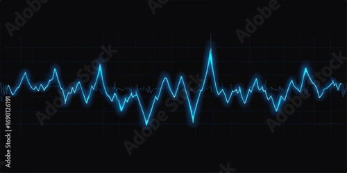 Green electrocardiogram waves showing a heart pulse beat on a medical monitor