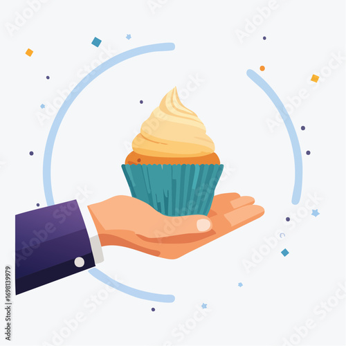 Hand Holding Cupcake with Cream Swirl on White Background