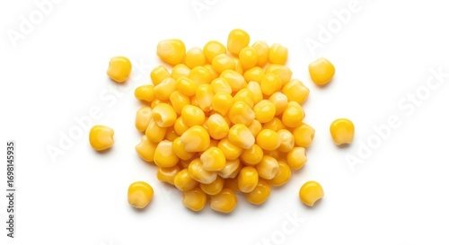 Bright yellow sweet corn kernels in a neat heap, isolated on a clean white background, highlighting fresh and healthy food concepts.