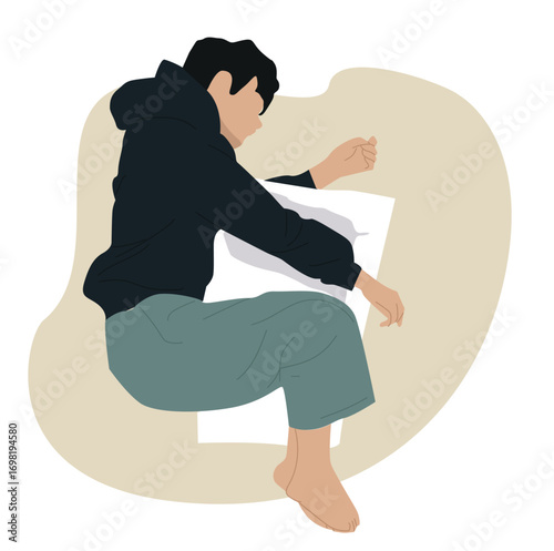 man sleeping hugging a pillow