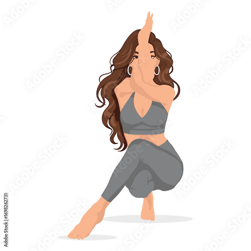 A woman in athletic wear performs the Eagle Pose in yoga, demonstrating flexibility and balance.