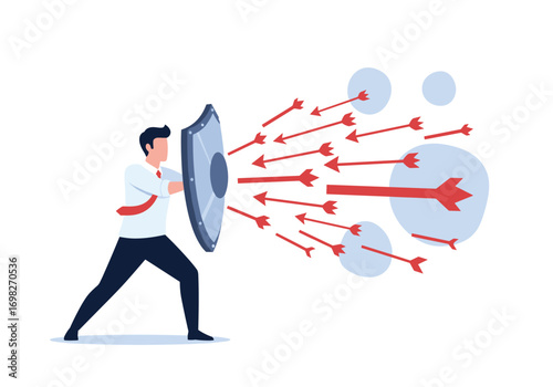 Businessman holding shield defending against incoming arrows representing business challenges and risks