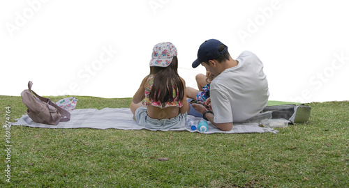 Father and daughter lying at grass isolated photo