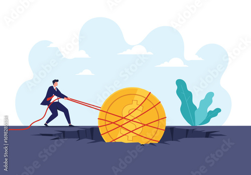 Businessman struggling to pull a large entangled coin from a dangerous hole