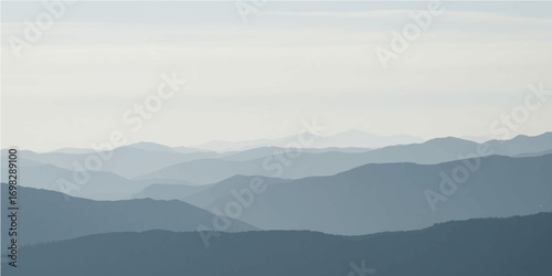 Misty morning view of mountains in the fog