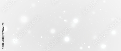 Elegant glowing stardust with golden dust, soft sparkle, shining particles and glitter confetti in festive abstract background for magic illumination, luxury card and Christmas design.