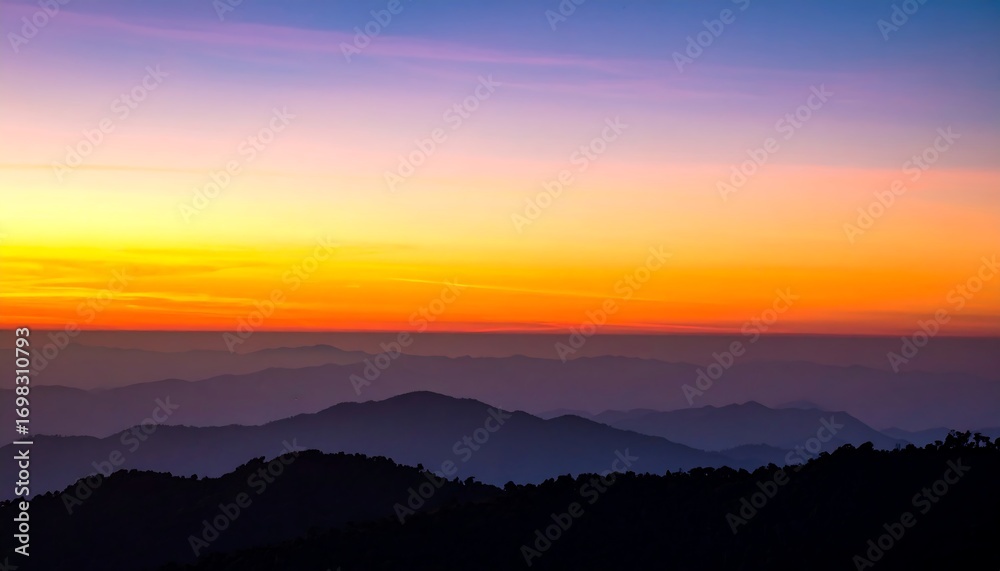 Obraz premium Sunrise over mountain ranges