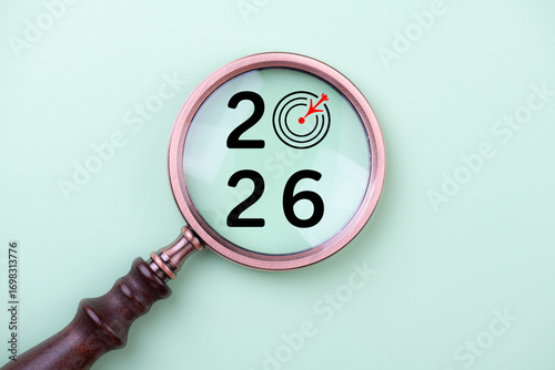 2026 New Year card. New Years goals 2026 with magnifying glass, target icon. Concept 2026 New Year background. Business, resolutions, goals, inspiration, financial, success, ideas