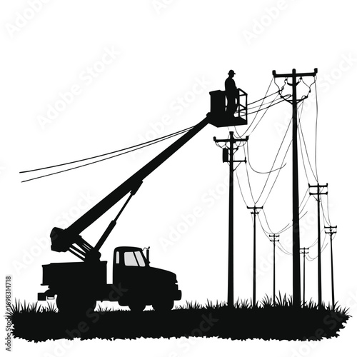 Electrician in aerial lift servicing power lines silhouette