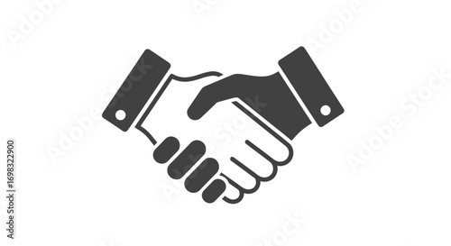 Two hands in a firm handshake, symbolizing agreement and partnership.