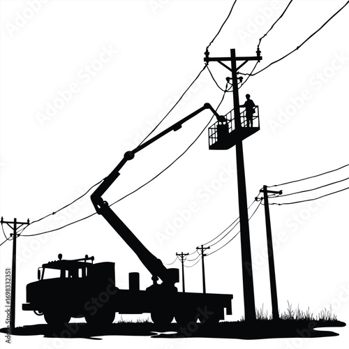 Silhouette of worker in aerial lift truck on power lines