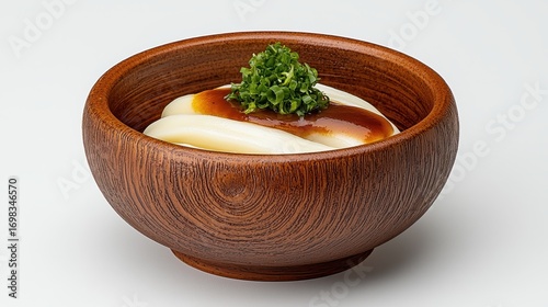 Creamy Dish with Brown Sauce in Rustic Wooden Bowl