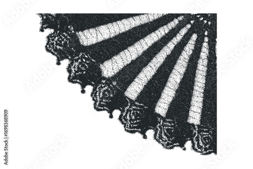 Intricate black and white lace fan motif isolated on white with distressed texture
