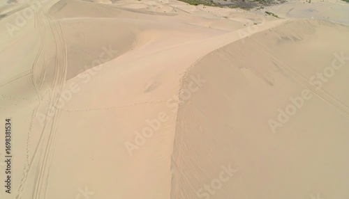 Fototapeta Naklejka Na Ścianę i Meble -  Aerial View of Warm Beige Sand Dunes with Micro Ripples