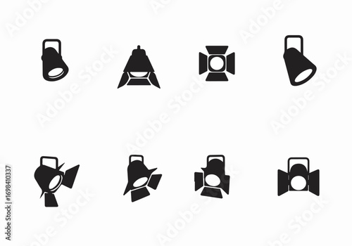 Minimalist black vector icons illustrating various studio lights, spotlights, and stage lighting equipment on a clean white background.