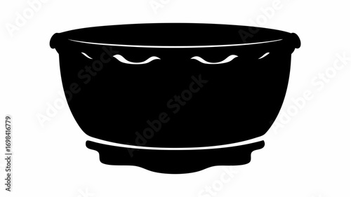 Silhouette of a wide black bowl with a decorative rim sitting on a small pedestal base design element