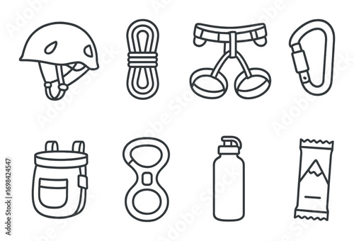 Set of essential climbing gear: helmet, rope, harness, carabiner, backpack, belay device, bottle, energy bar