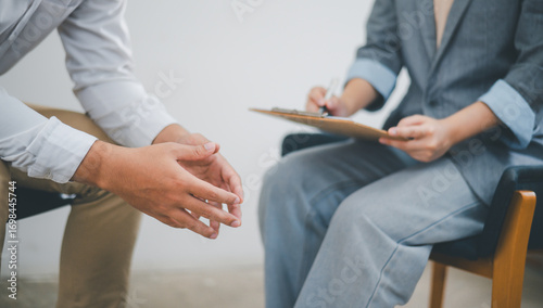 Psychologist listening to the problem of a patient with mental health problems, a patient for treatment encouragement Love and family problems, bipolar, depressed patients prevent suicide