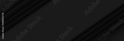 A pattern of black geometric lines on a dark background
