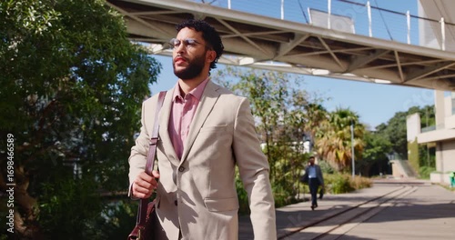 Wallpaper Mural Walking, travel and business man in city for commute, professional and property manager. Real estate developer, morning and downtown with person outdoor for opportunity, moving and confidence Torontodigital.ca